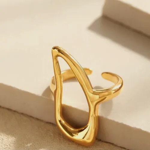 Open gold drop ring.