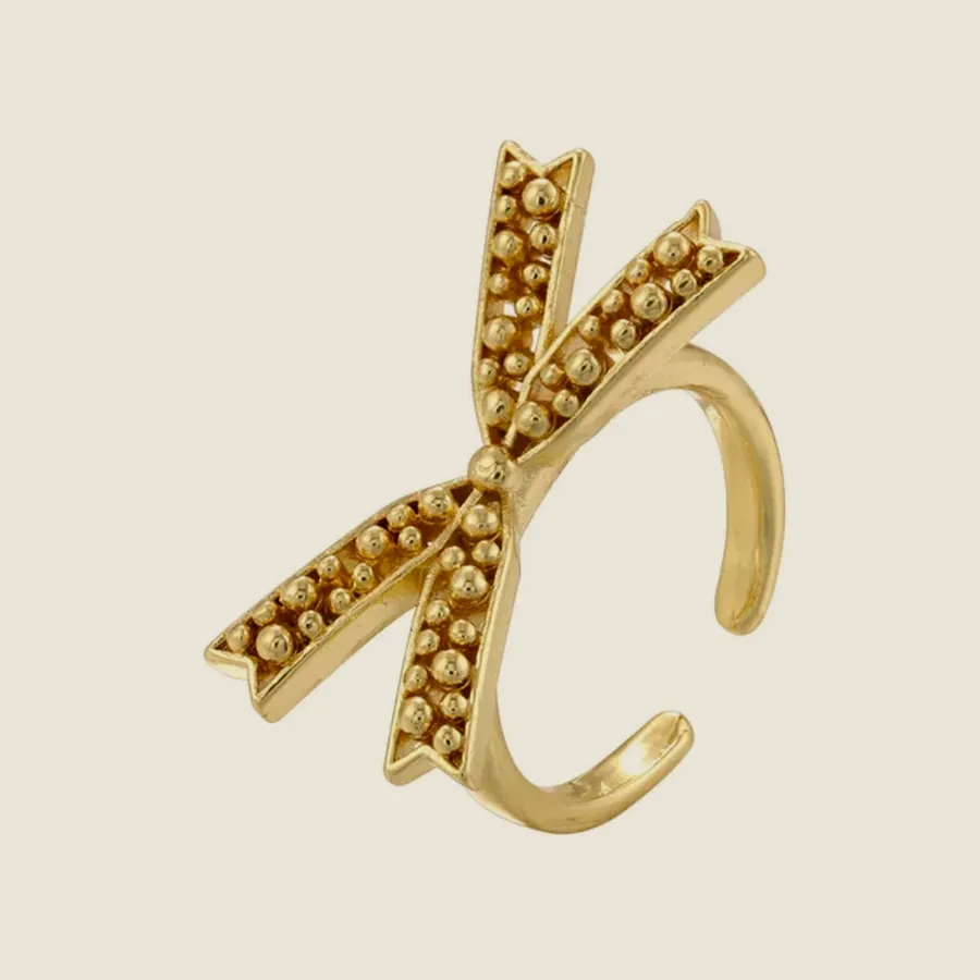 Gold bow ring.