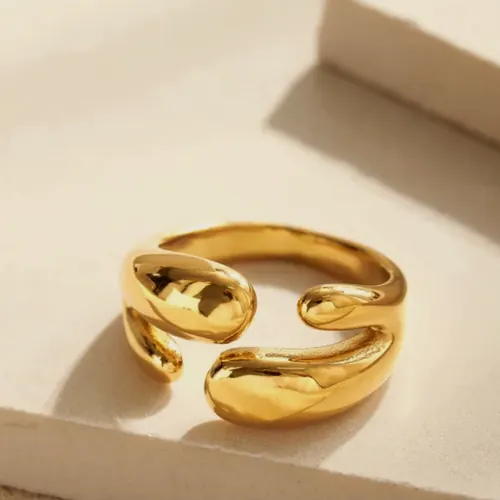 Gold knot ring.
