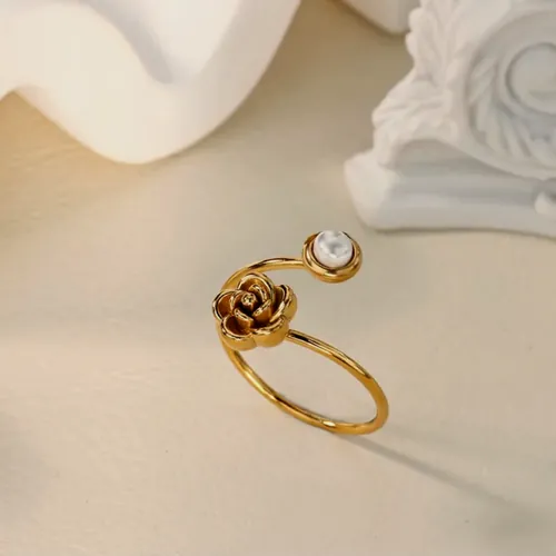 Open rose and pearl ring.