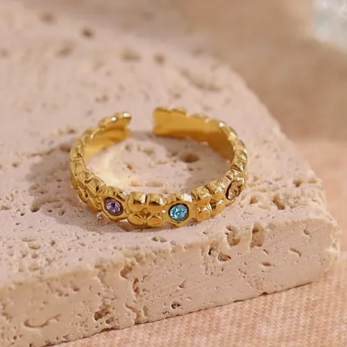 Hammered ring with three stones.