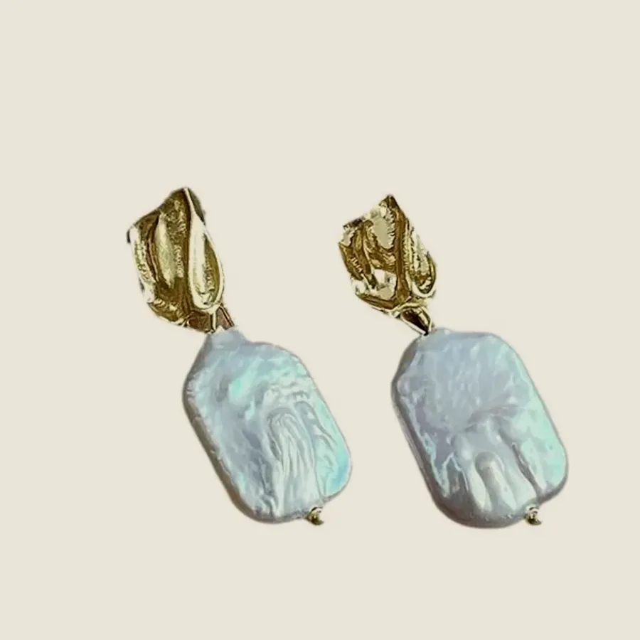 Square pearl earrings with a leaf.