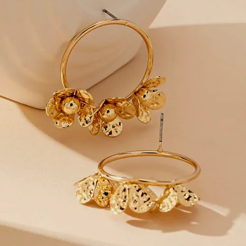 Gold hoops with hanging charms.