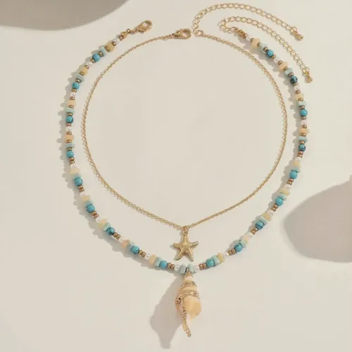 Bead necklace with shell and starfish.