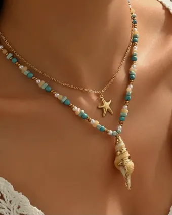 The shell necklace worn.
