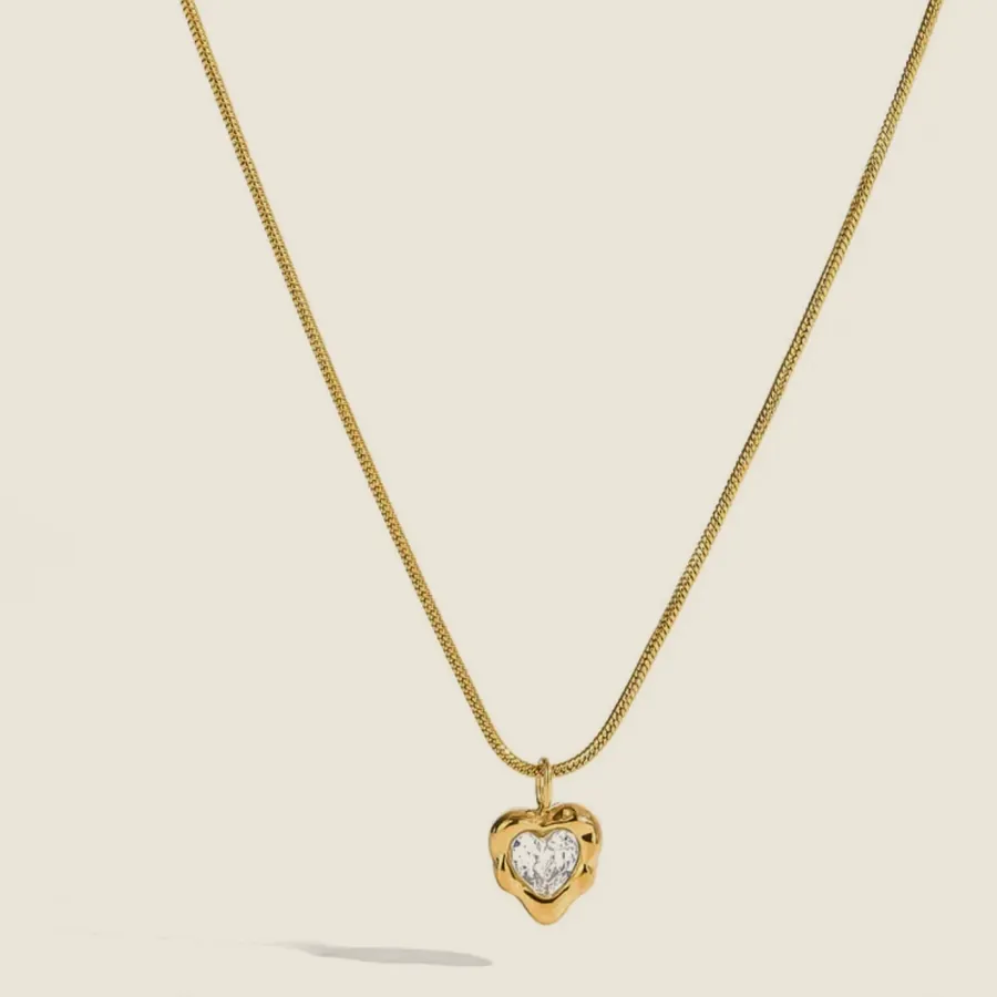 Necklace with a green heart.