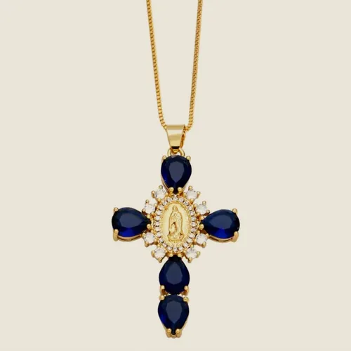 Necklace with a blue stone cross.