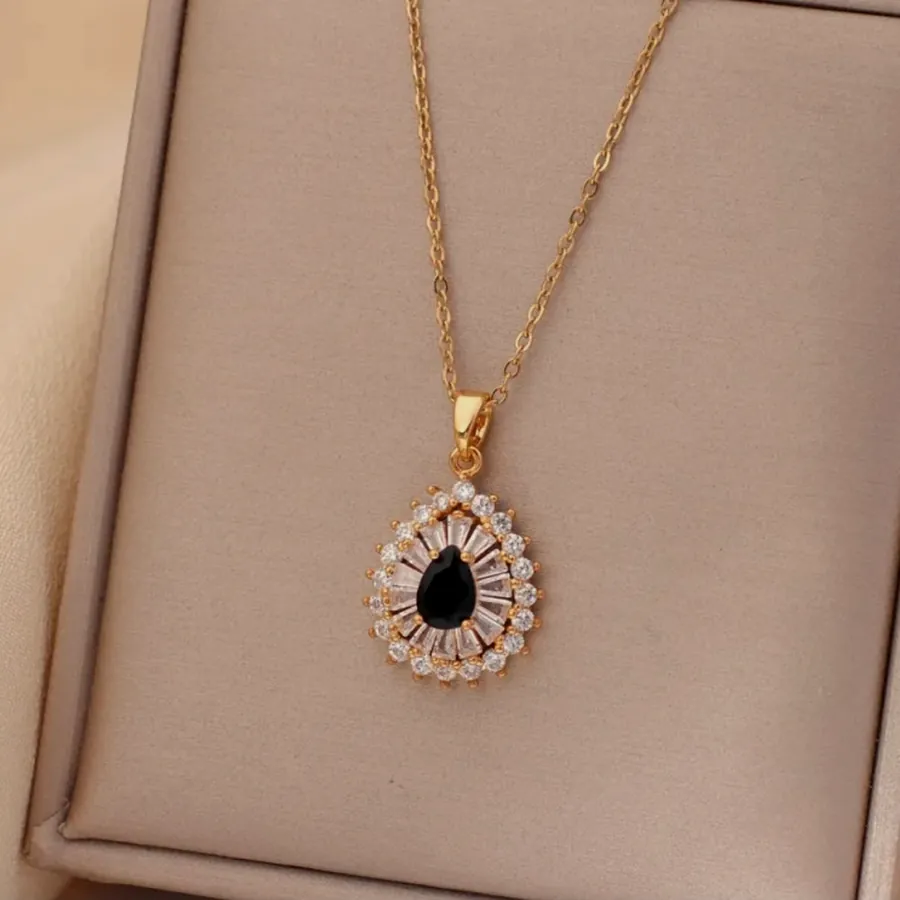 Necklace with a black drop and cubic zirconia.