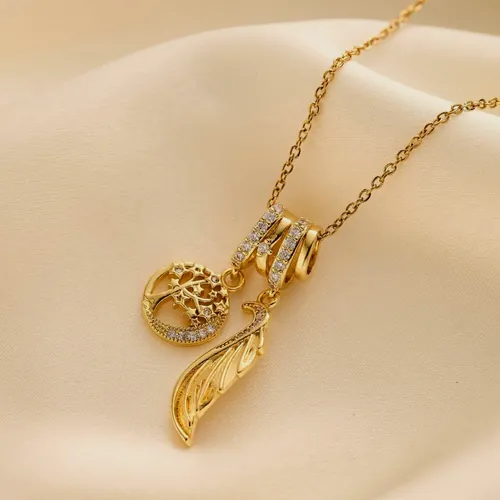 Necklace with a gold leaf-bud pendant.