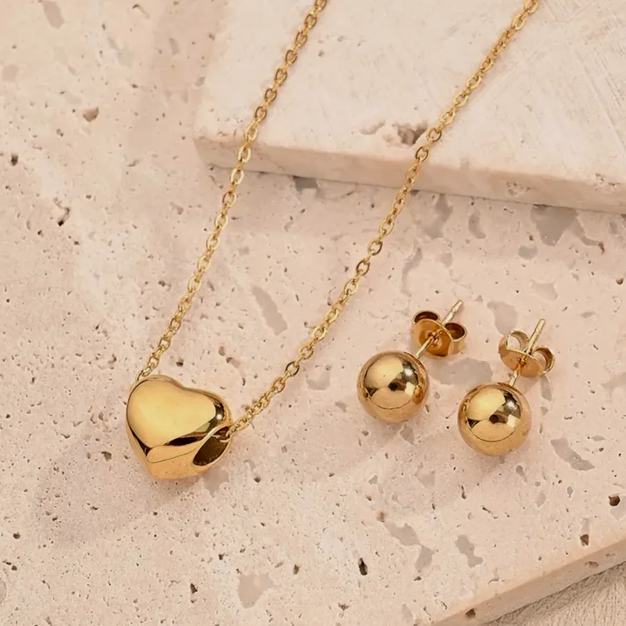 Heart necklace and ball stud set.