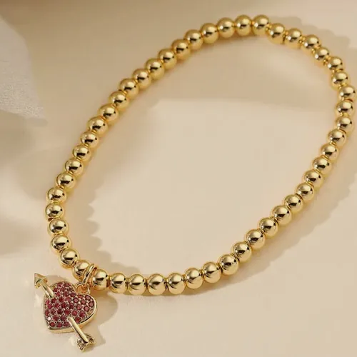 Bead bracelet with a red cluster.
