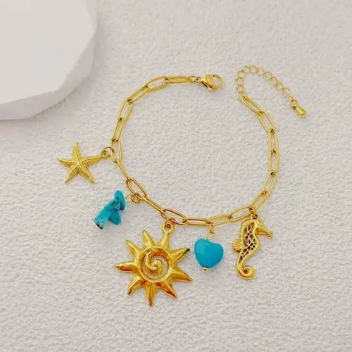 Charm bracelet with sun and star.