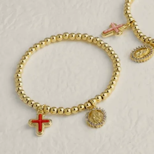Bead bracelet with cross and medal.