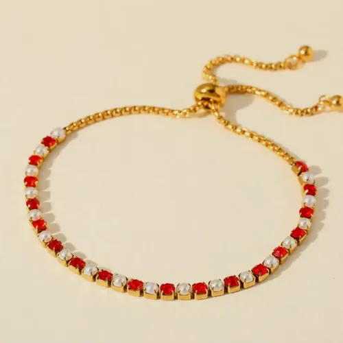 Red crystal tennis bracelet.