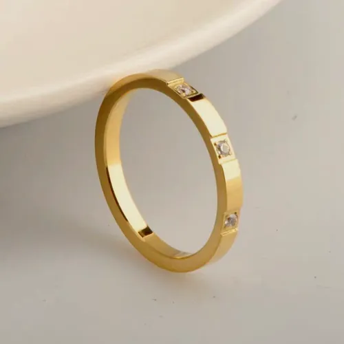 Gold crystal band ring.