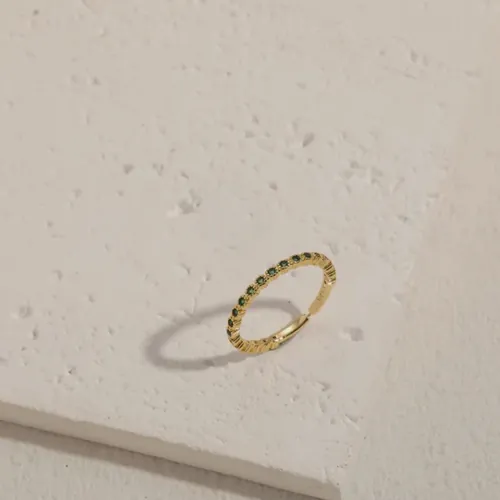 Thin gold bead ring.