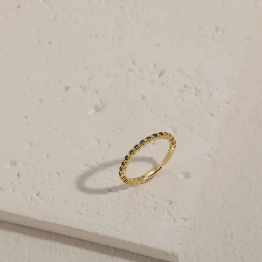 Thin gold bead ring.