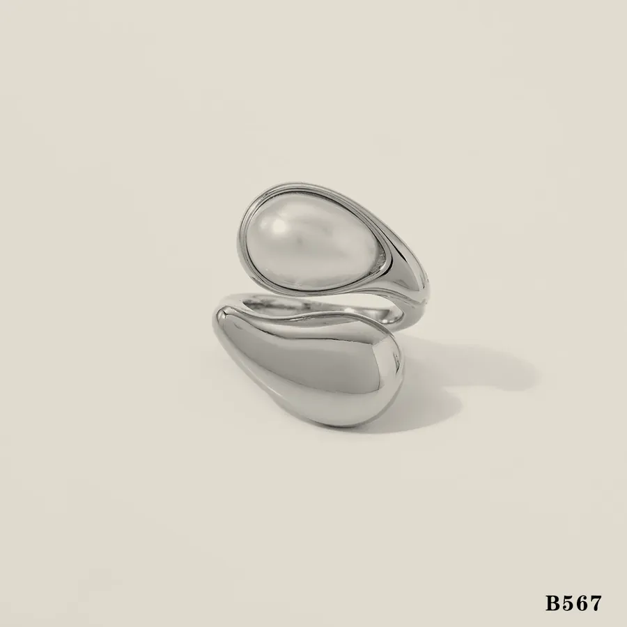 Silver-tone ring with an oval pearl.
