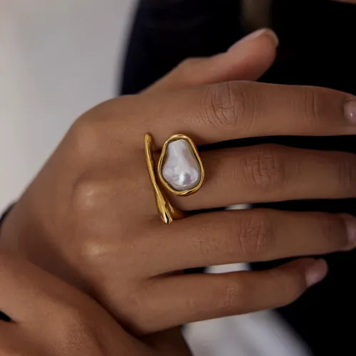 Nacre signet ring, worn.
