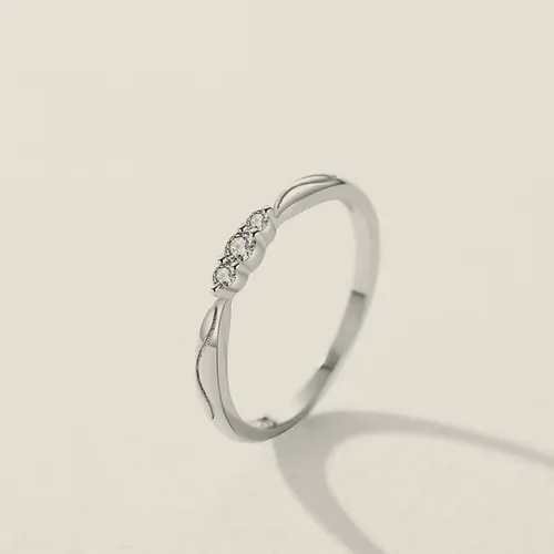 Braided silver-tone crystal ring.