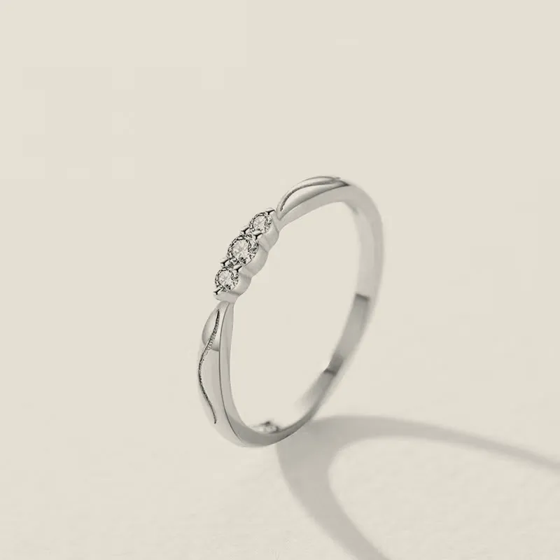 Braided silver-tone crystal ring.