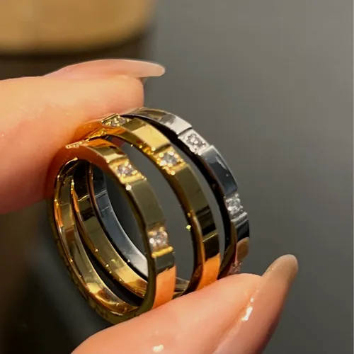 Stacked black band rings.