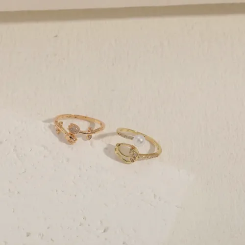 Woven-texture gold rings.