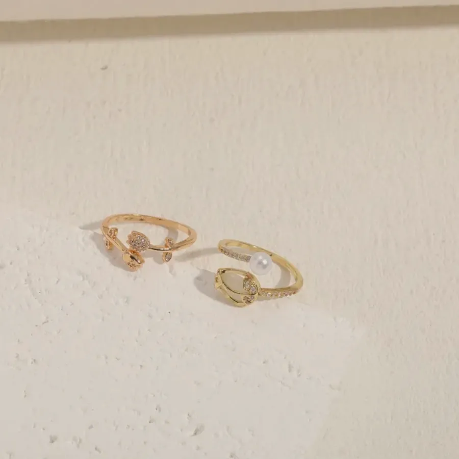 Woven-texture gold rings.