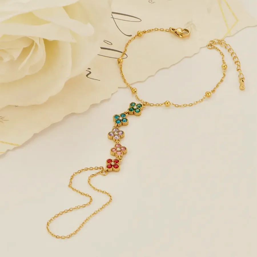 Heart earring with crystal flowers.