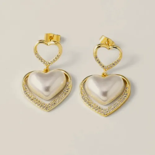 Nacre heart earrings with pavé.