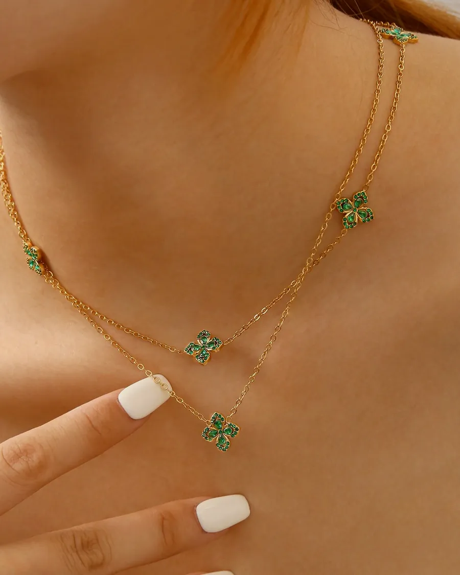 Green clover necklace, worn.