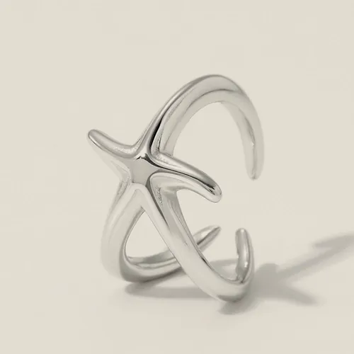 Silver-tone starfish ear cuff.