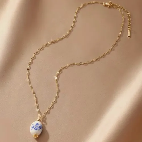 Necklace with a single baroque pearl.