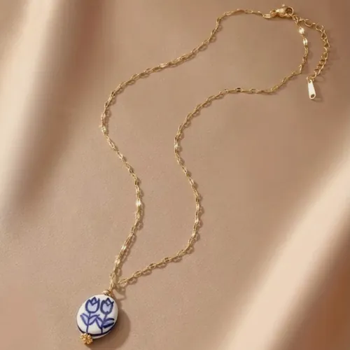 Necklace with a blue-flower porcelain bead.