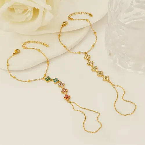 Hand chain with crystal flowers.