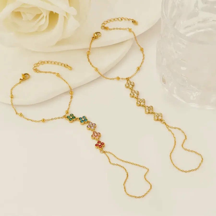 Hand chain with crystal flowers.
