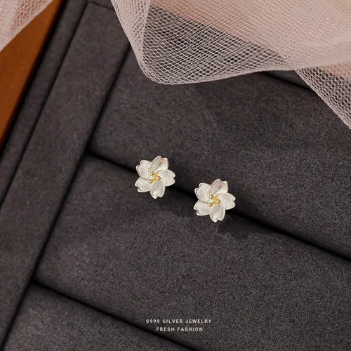Cherry blossom nacre studs.