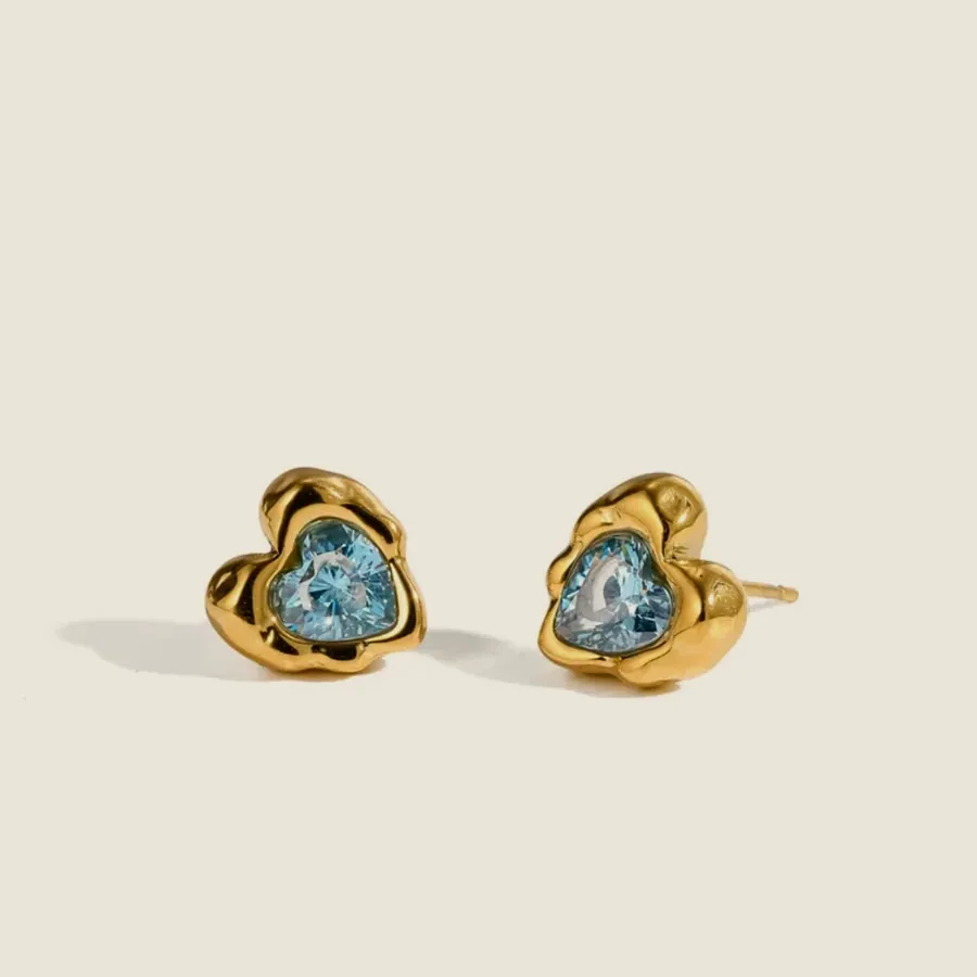 Blue crystal heart studs.