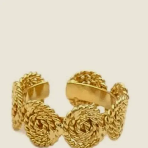 Woven band ring in close-up.