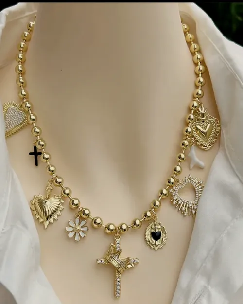 Statement charm necklace, worn.