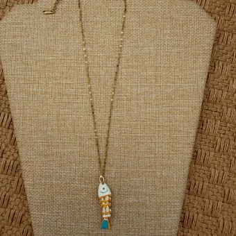 Another view of the dainty charm necklace.