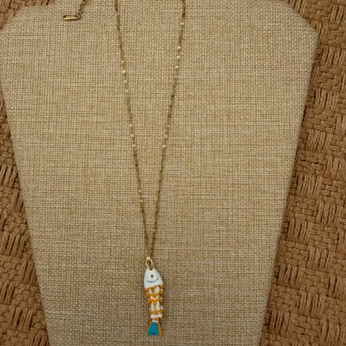 Dainty necklace with small charms.