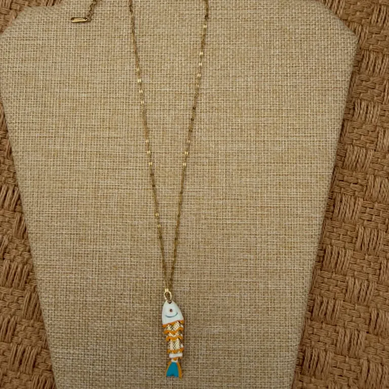 Dainty necklace with small charms.