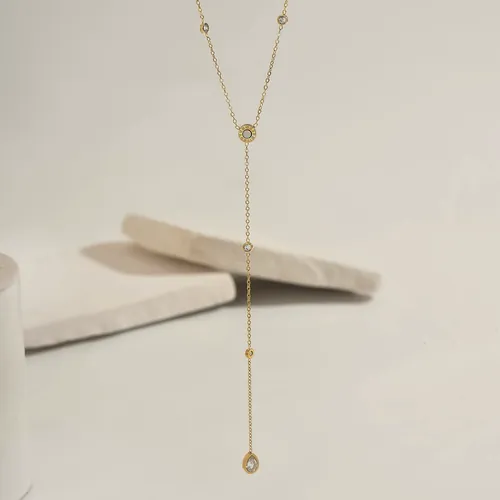 Gold lariat necklace with cubic zirconia.
