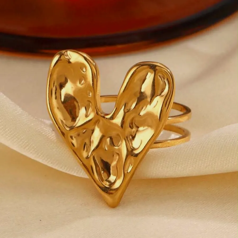 Gold hammered heart ring.