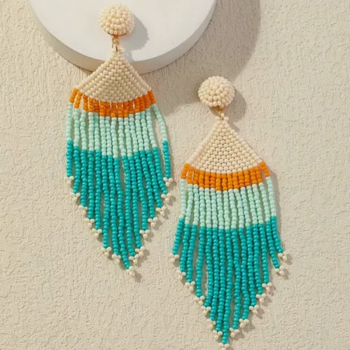 Turquoise seed-bead fringe earrings.