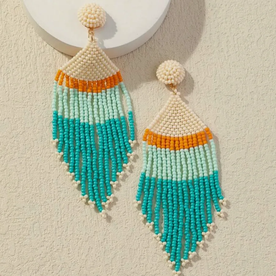 Turquoise seed-bead fringe earrings.