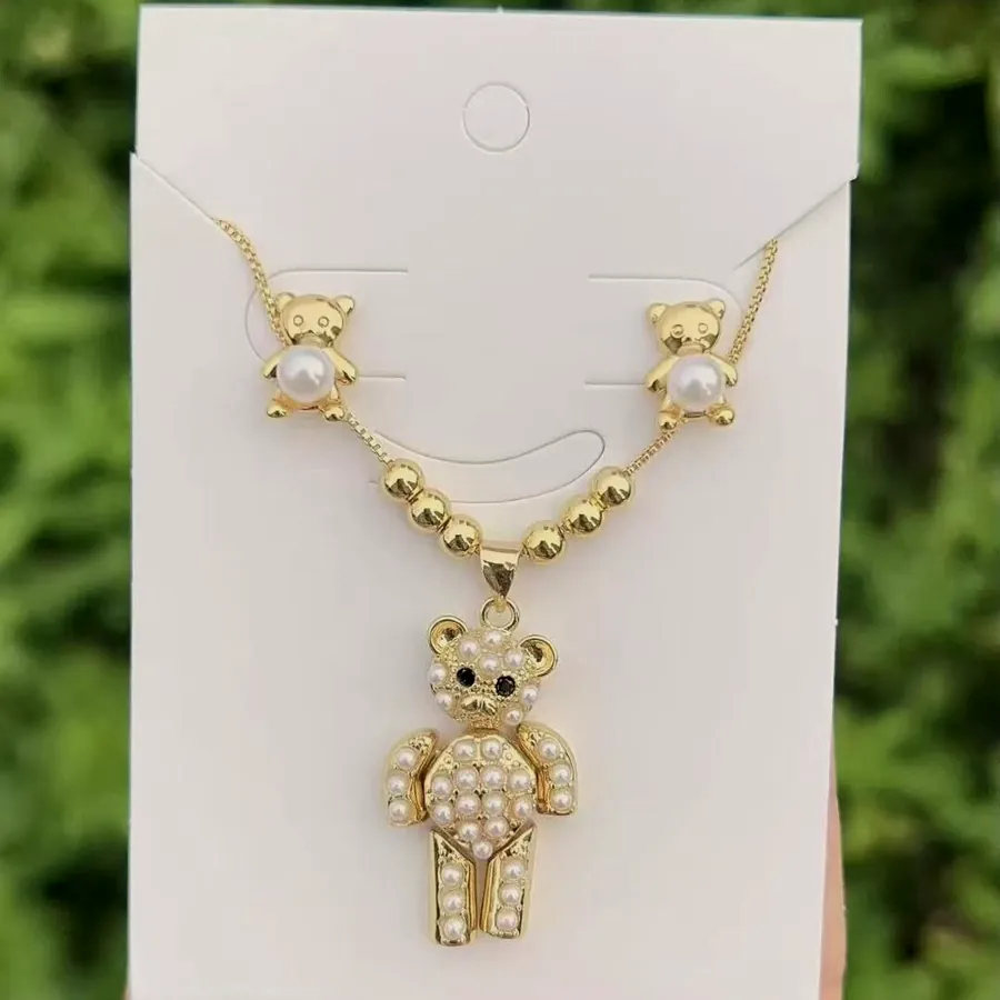 Pearl bear necklace and stud set.