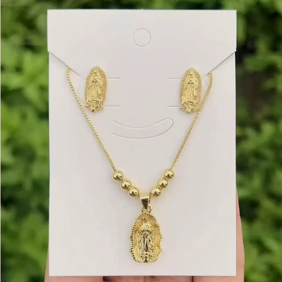 Gold medal necklace and stud set.