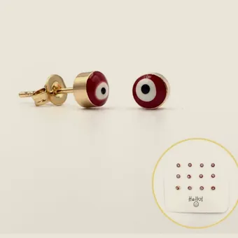 Red enamelled eye studs with a size card.